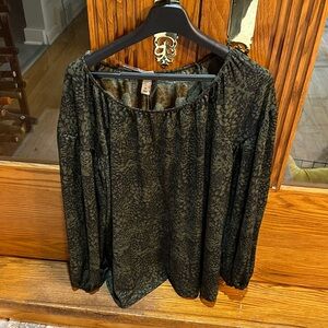 Green and black blouse